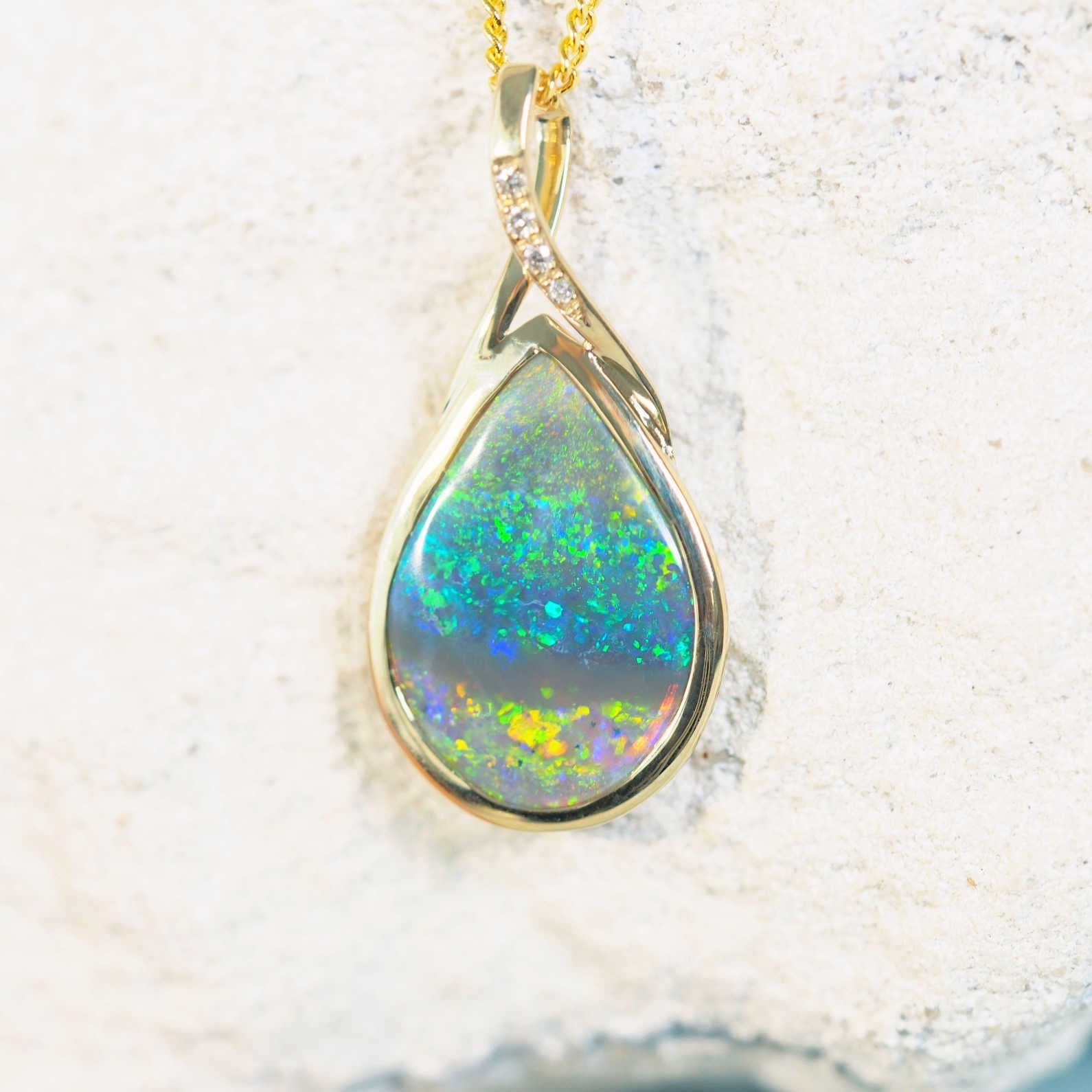 colourful black crystal opal pendant from lightning ridge