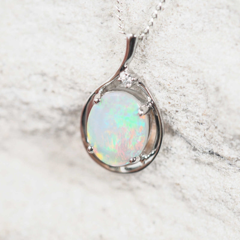 Opal pendant featuring an oval-shaped South Australian solid white opal