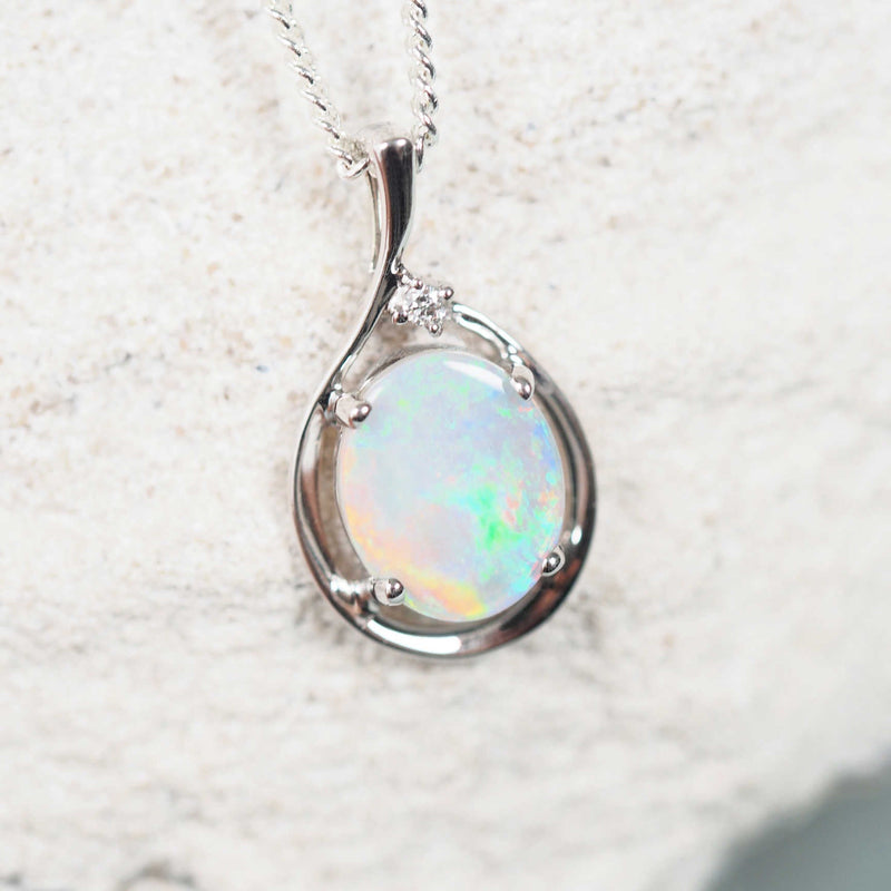 Oval-shaped South Australian opal pendant with vibrant colours