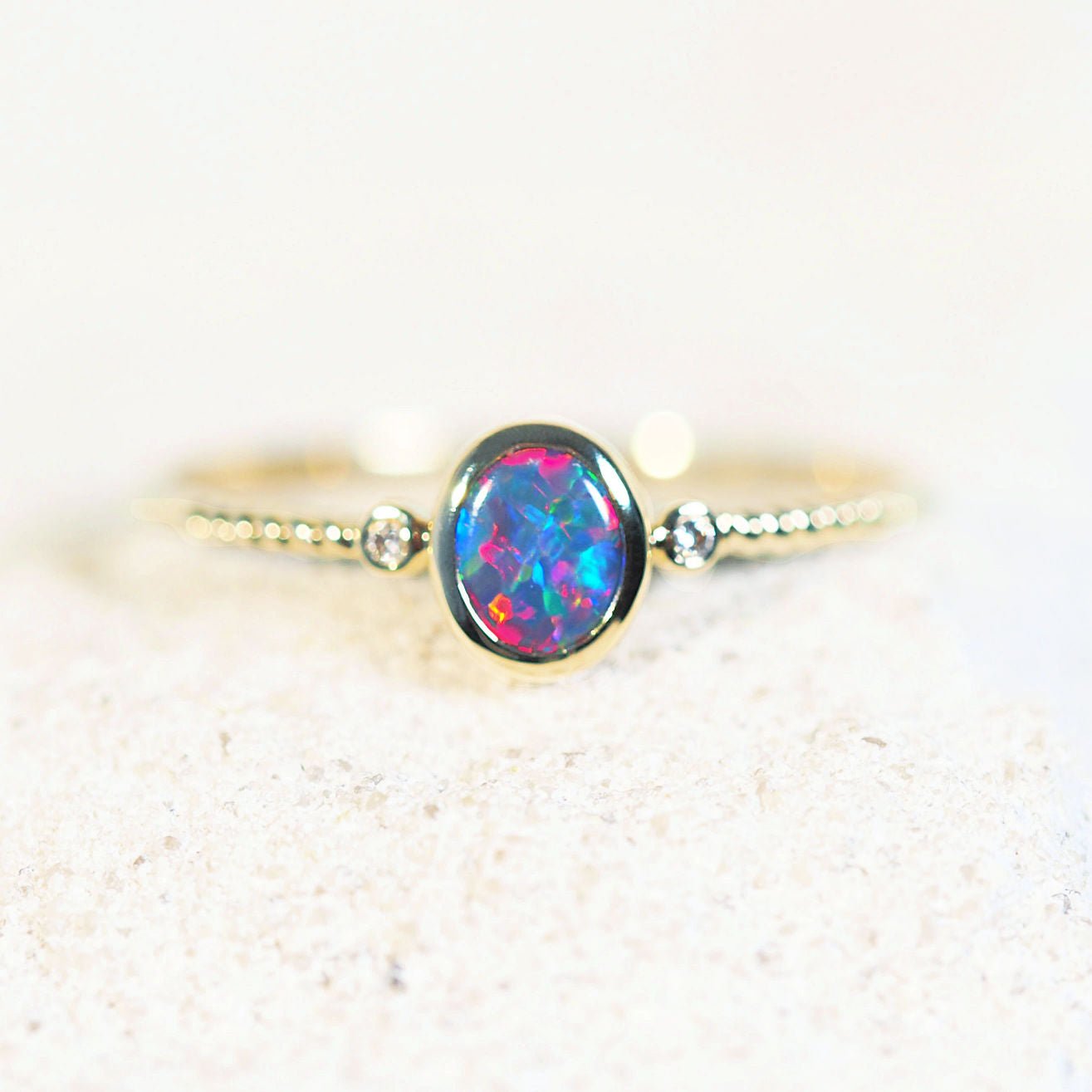 black opal ring in gold