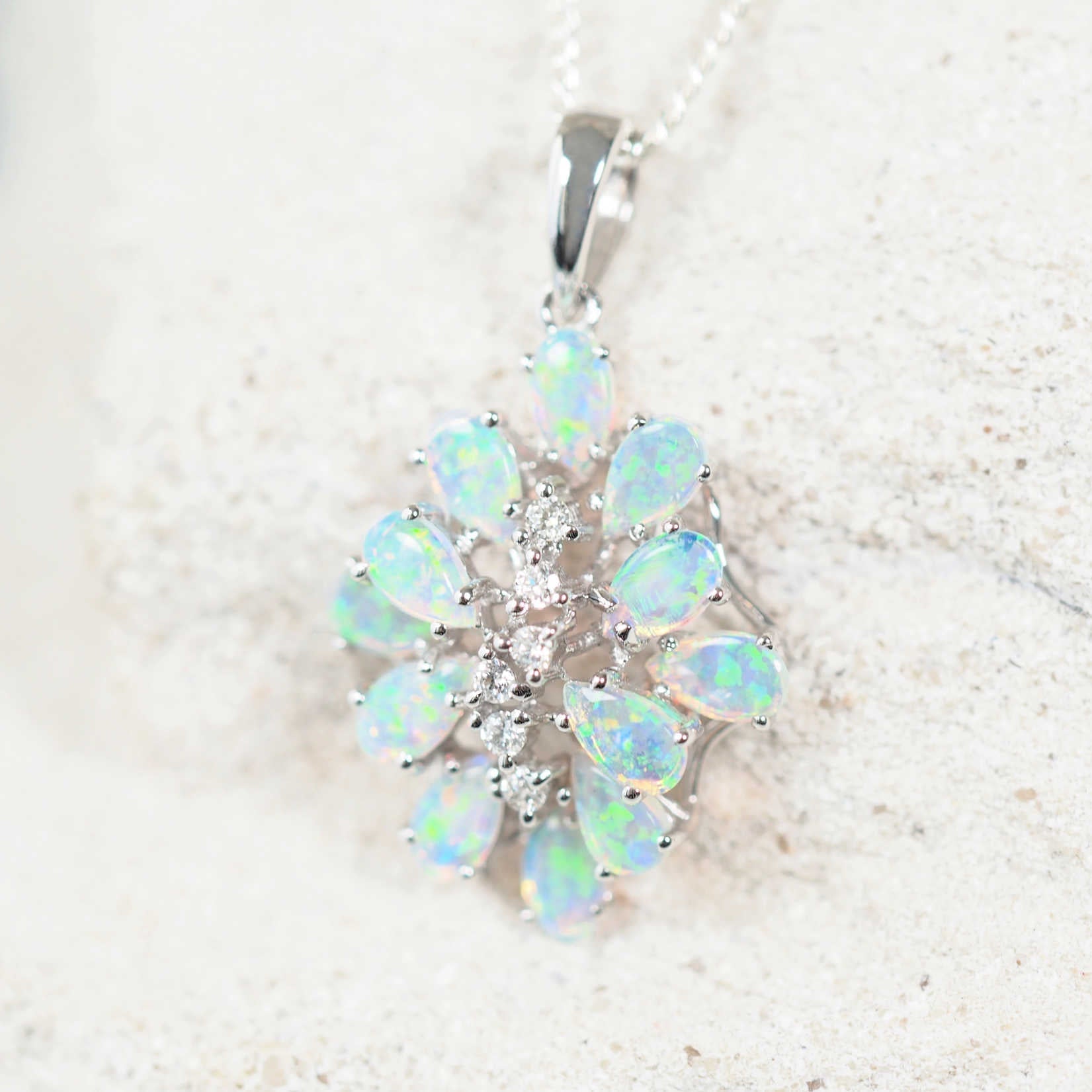 crystal opal pendant set with 12 bright south australian solid opals