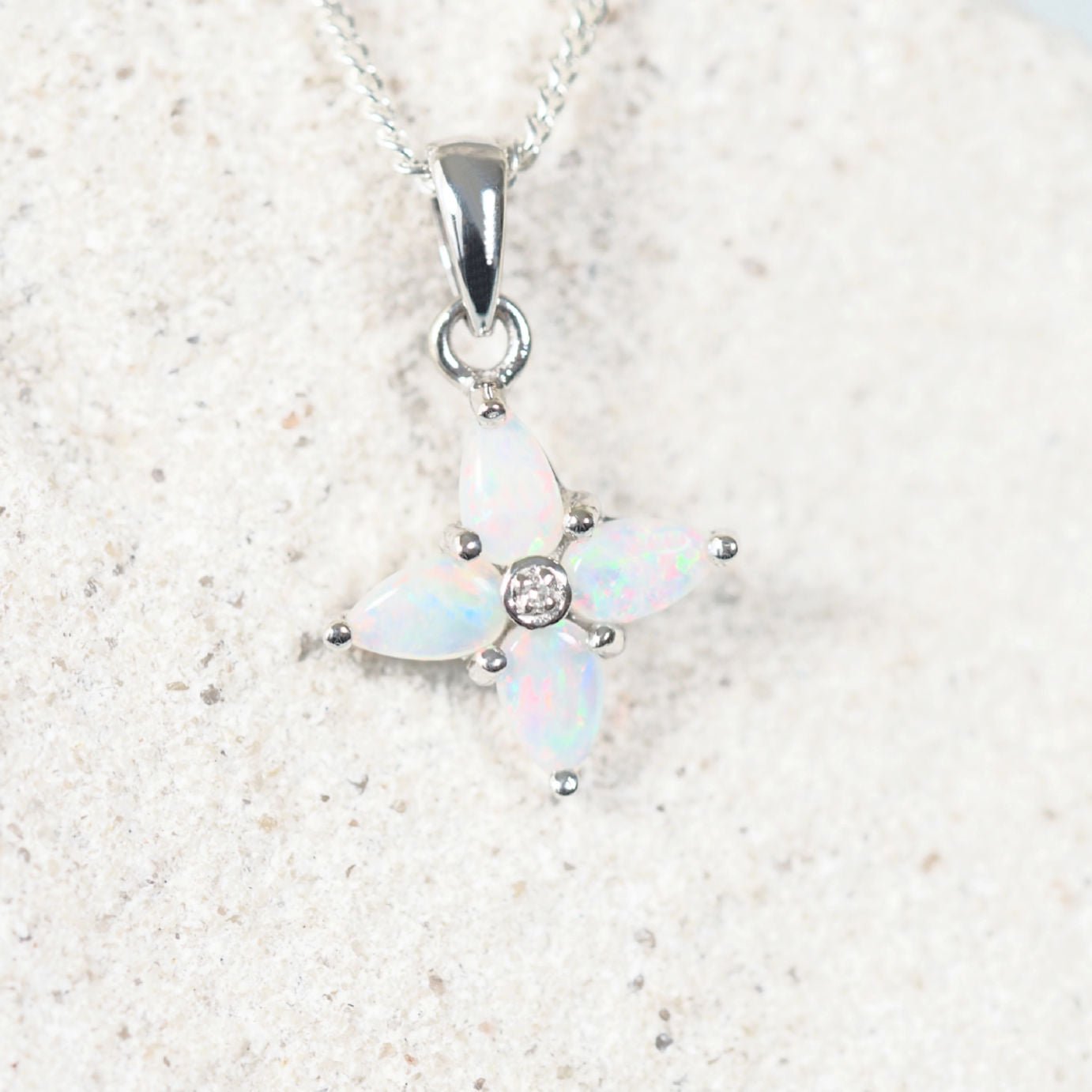 colourful flower-cross design opal pendant with one diamond