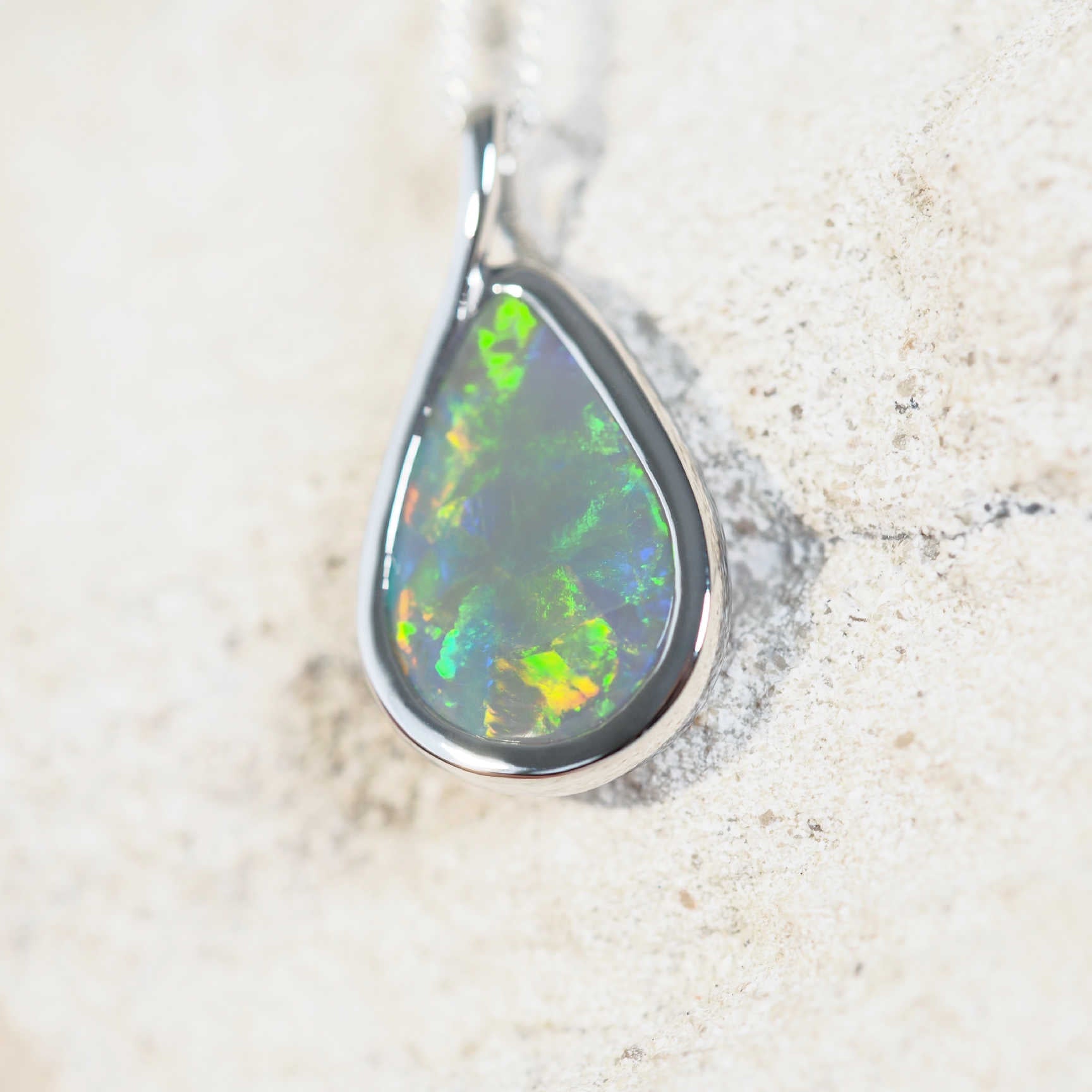 black opal pendant set in 14ct white gold