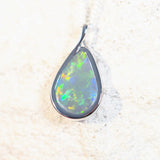 colourful black opal pendant set in white gold