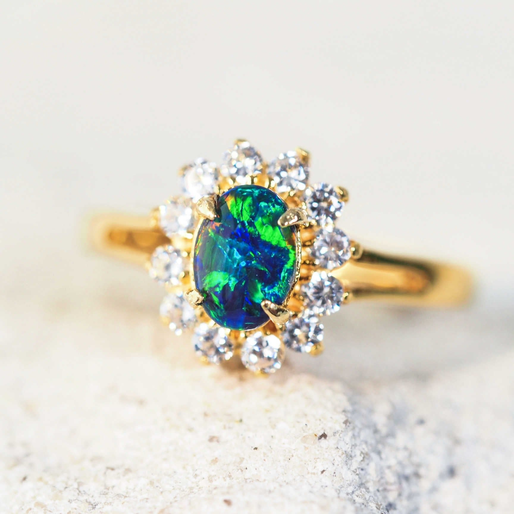 blue and green opal ring set in gold plated silver