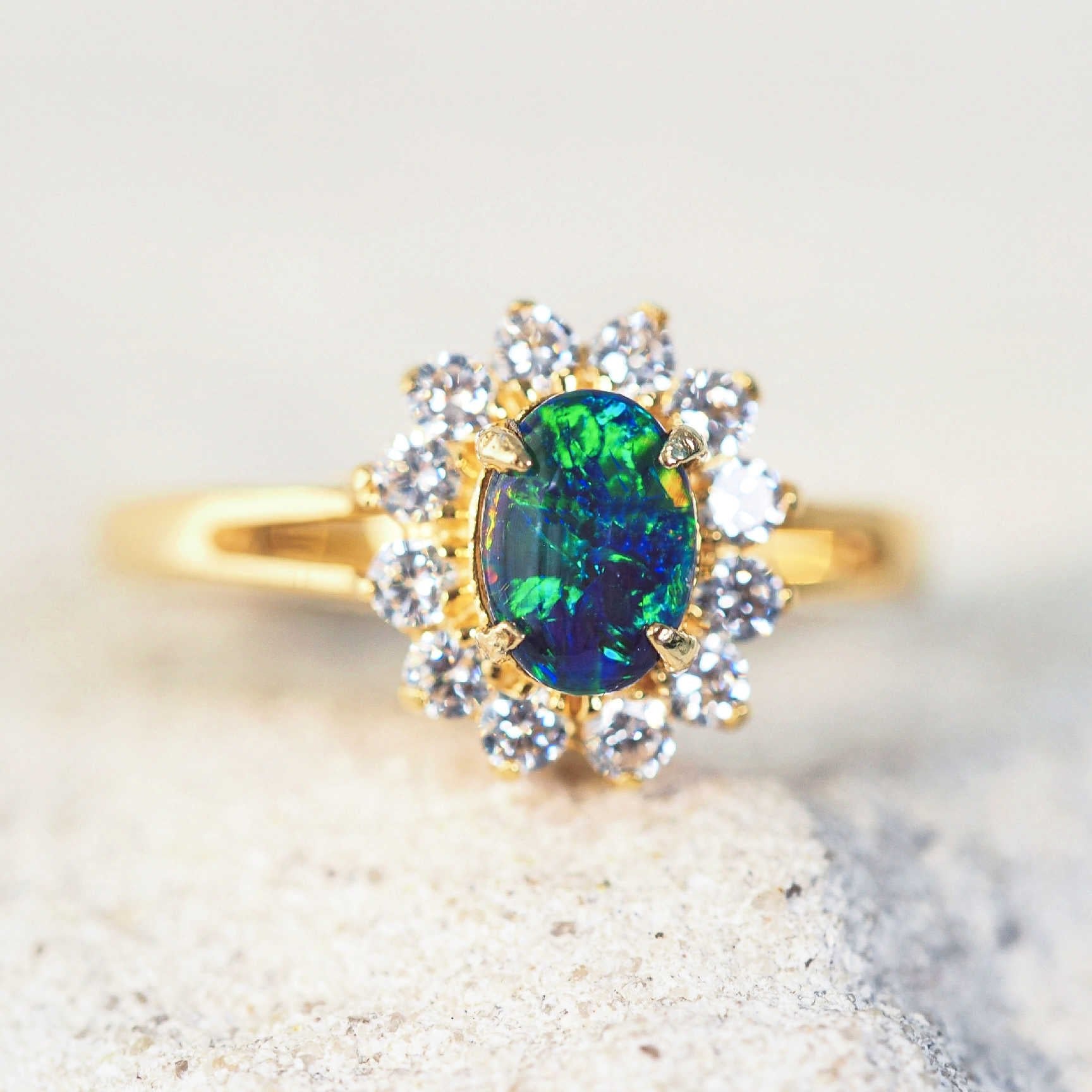 blue opal ring set in gold plated silver with diamantes