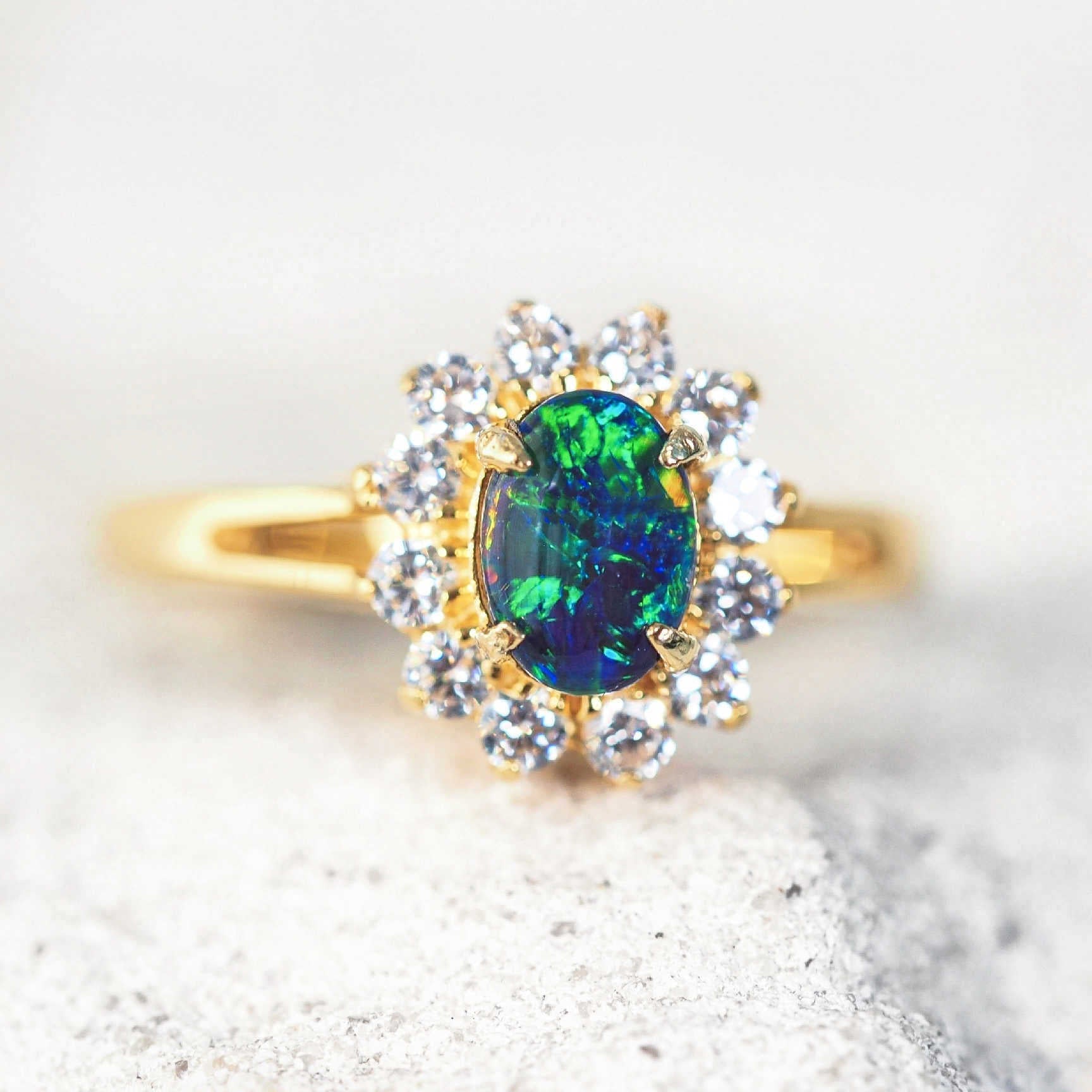 blue and green opal ring set in gold plated silver