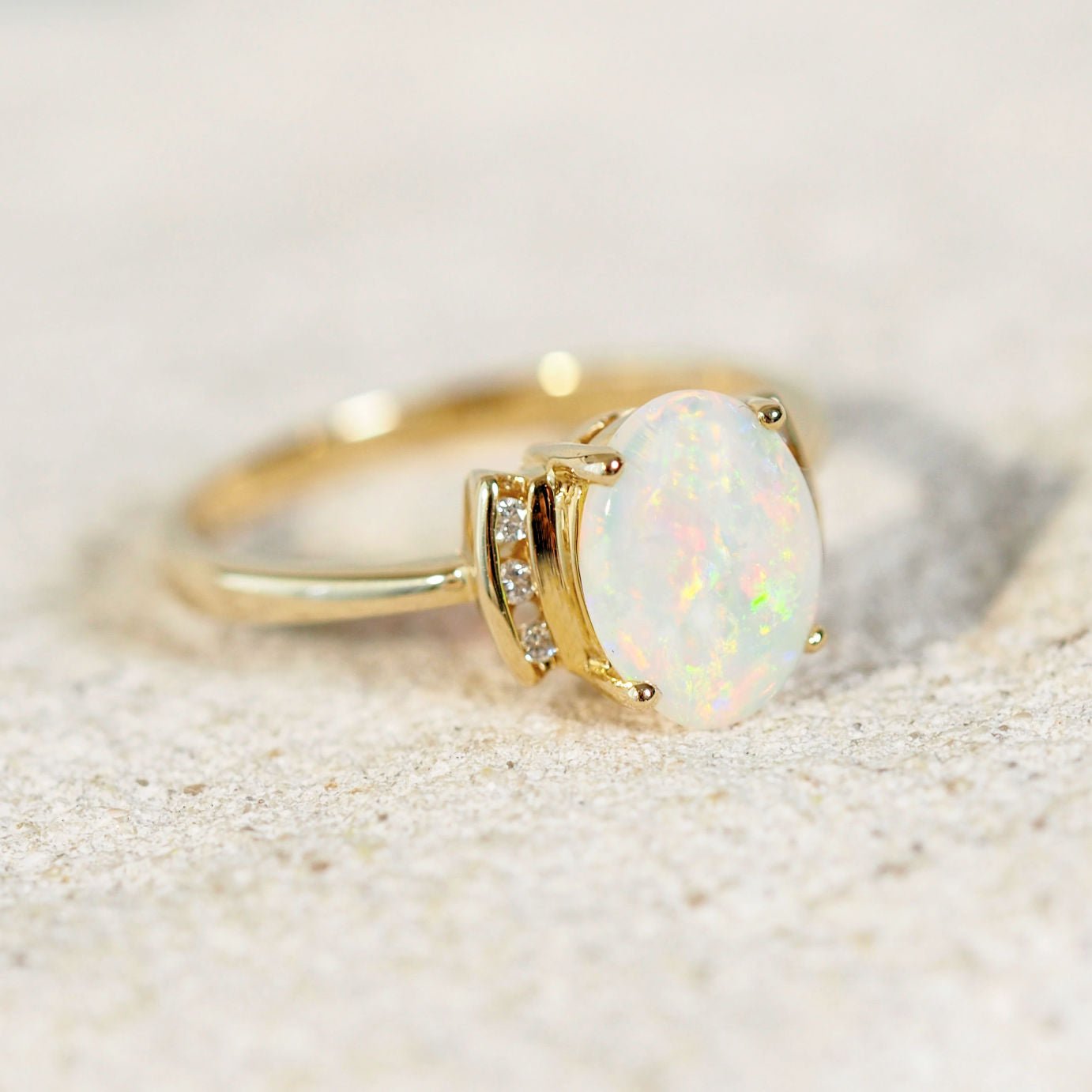 gold crystal opal ring with diamonds