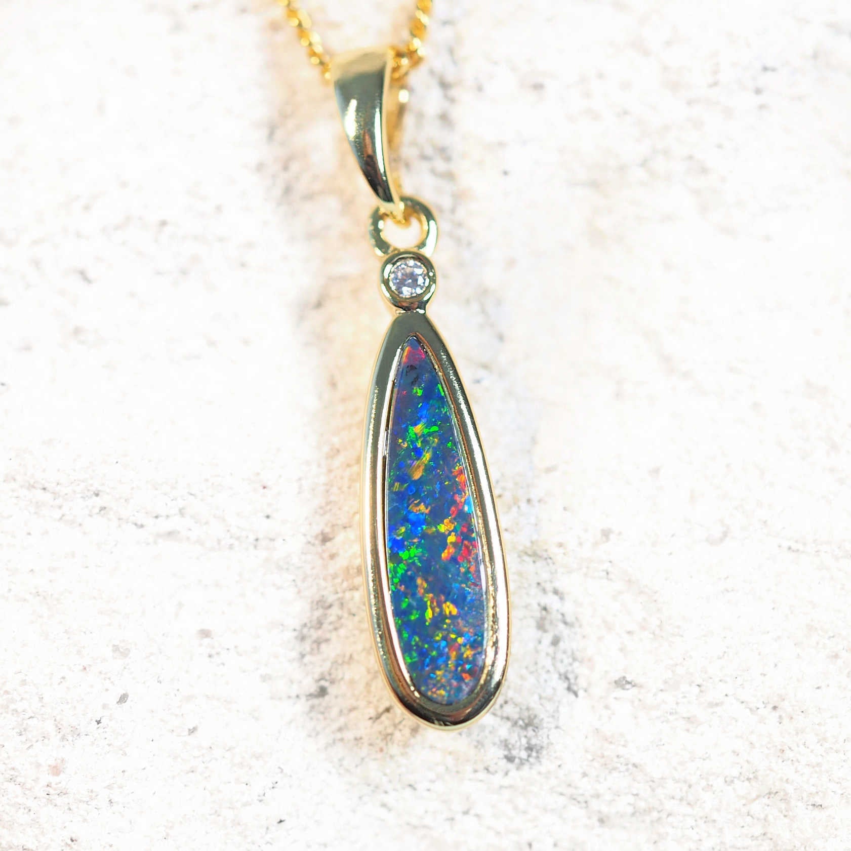 doublet opal gold plated silver pendant set with a colourful australian opal