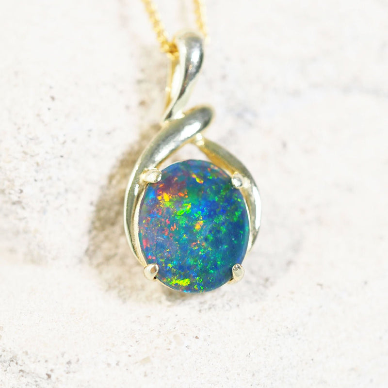 colourful opal pendant set in gold plated silver