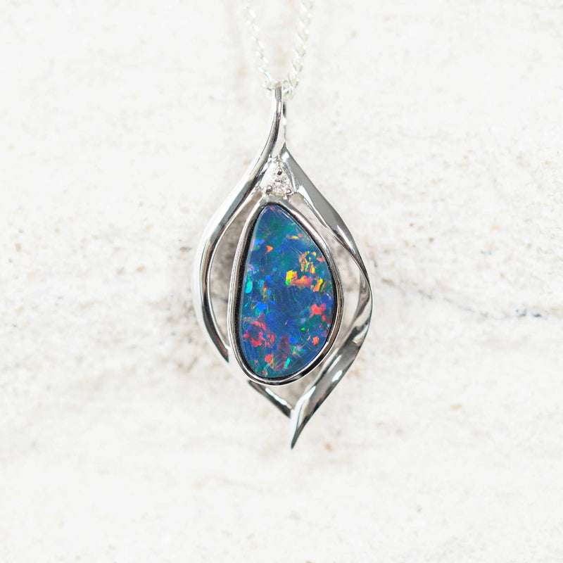 14ct white gold opal pendant featuring a freeform-shaped multi-coloured Australian doublet opal.