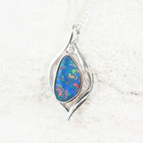 Close-up of the 'Serena' opal pendant showcasing the stunning multi-coloured Australian doublet opal in white gold.