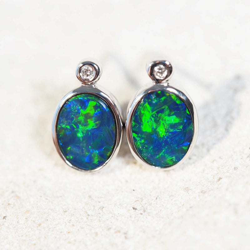 blue and green opal earrings white gold studs with diamonds