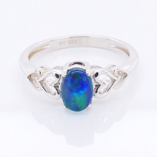 Sweetheart sterling silver heart design ring claw set with a beautiful oval blue and green Australian triplet opal.