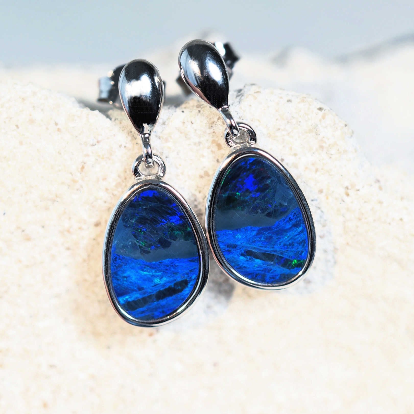 blue opal earrings set in silver