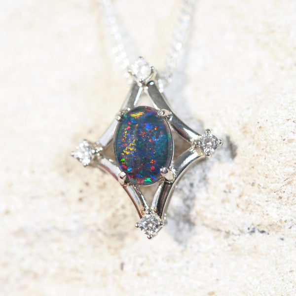 opal pendant set in sterling silver with four diamantes