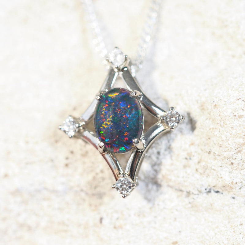 opal pendant set in sterling silver with four diamantes