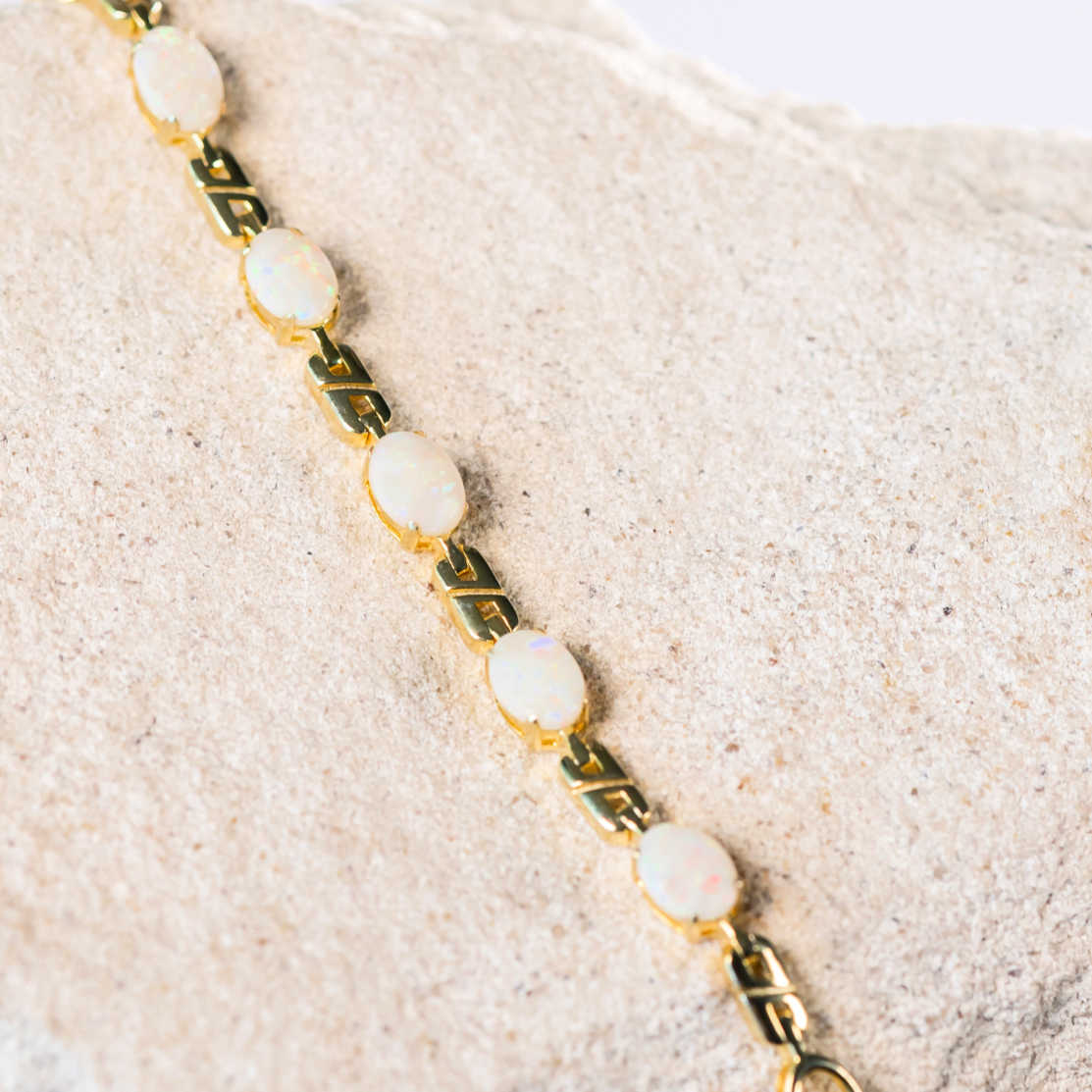 white opal bracelet set in gold plated silver