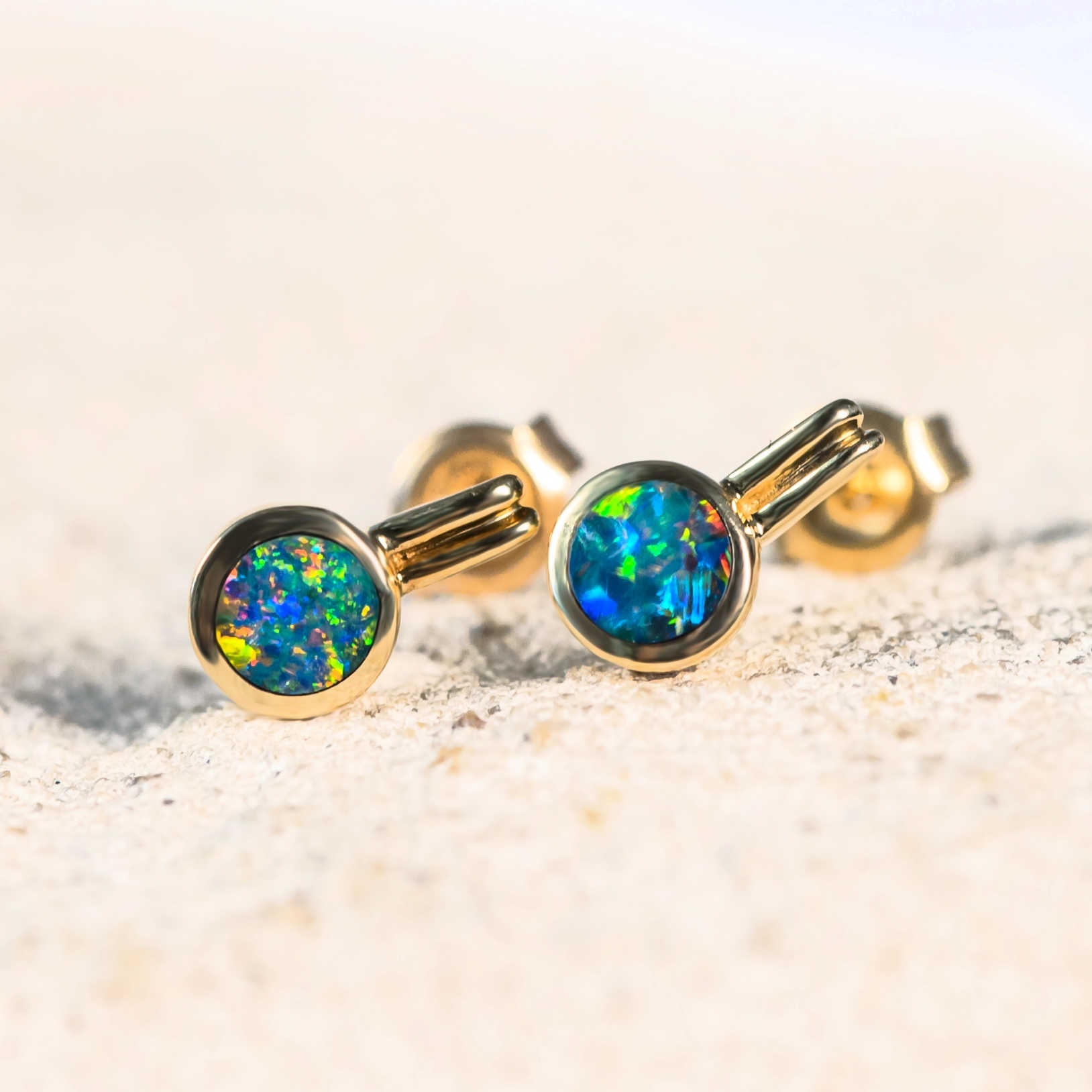 colourful round doublet opal earrings set in gold