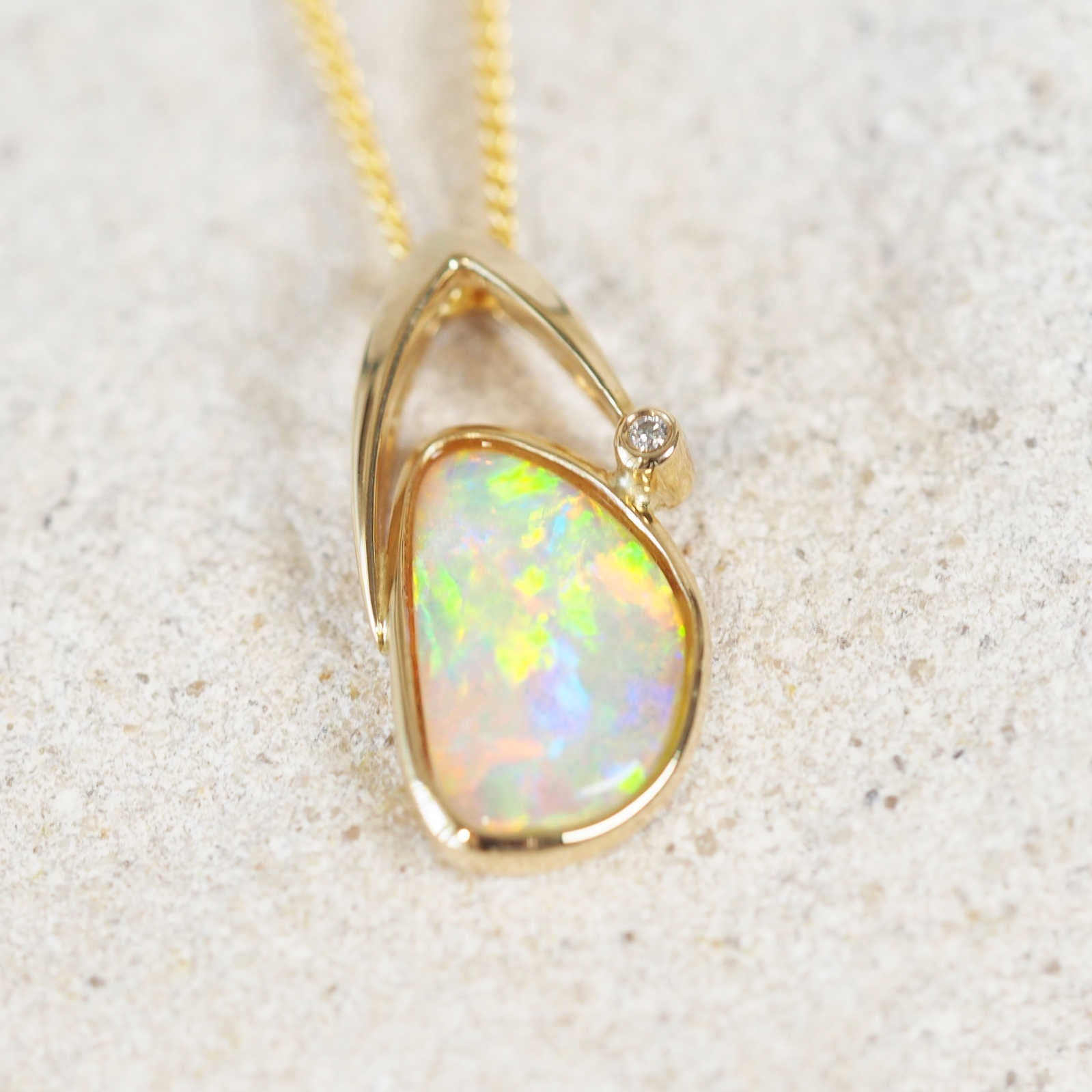 colourful crystal opal gold pendant