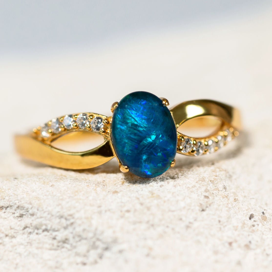 gold plated silver opal ring set with 10 diamantes