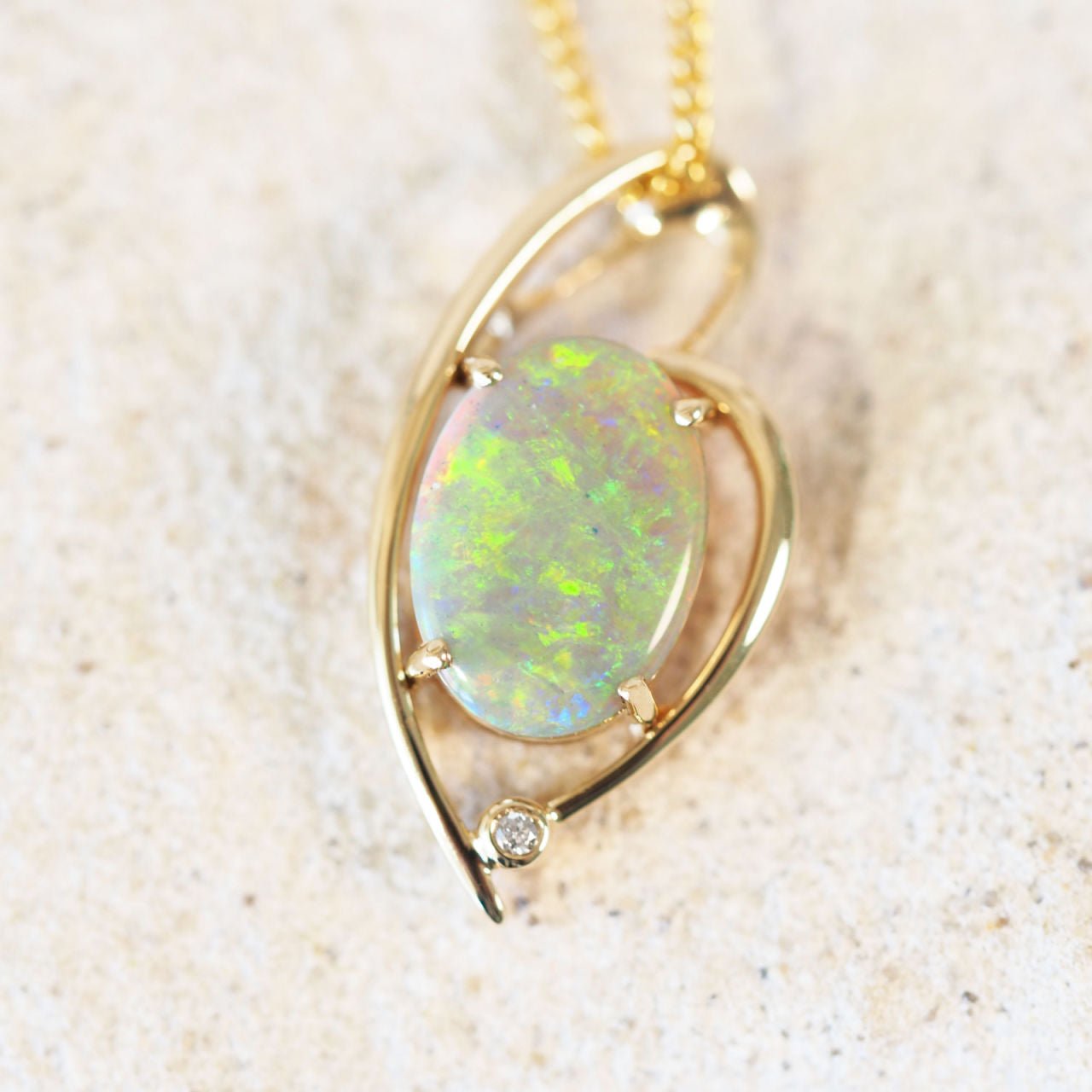 multi-colour dark crystal opal gold pendant