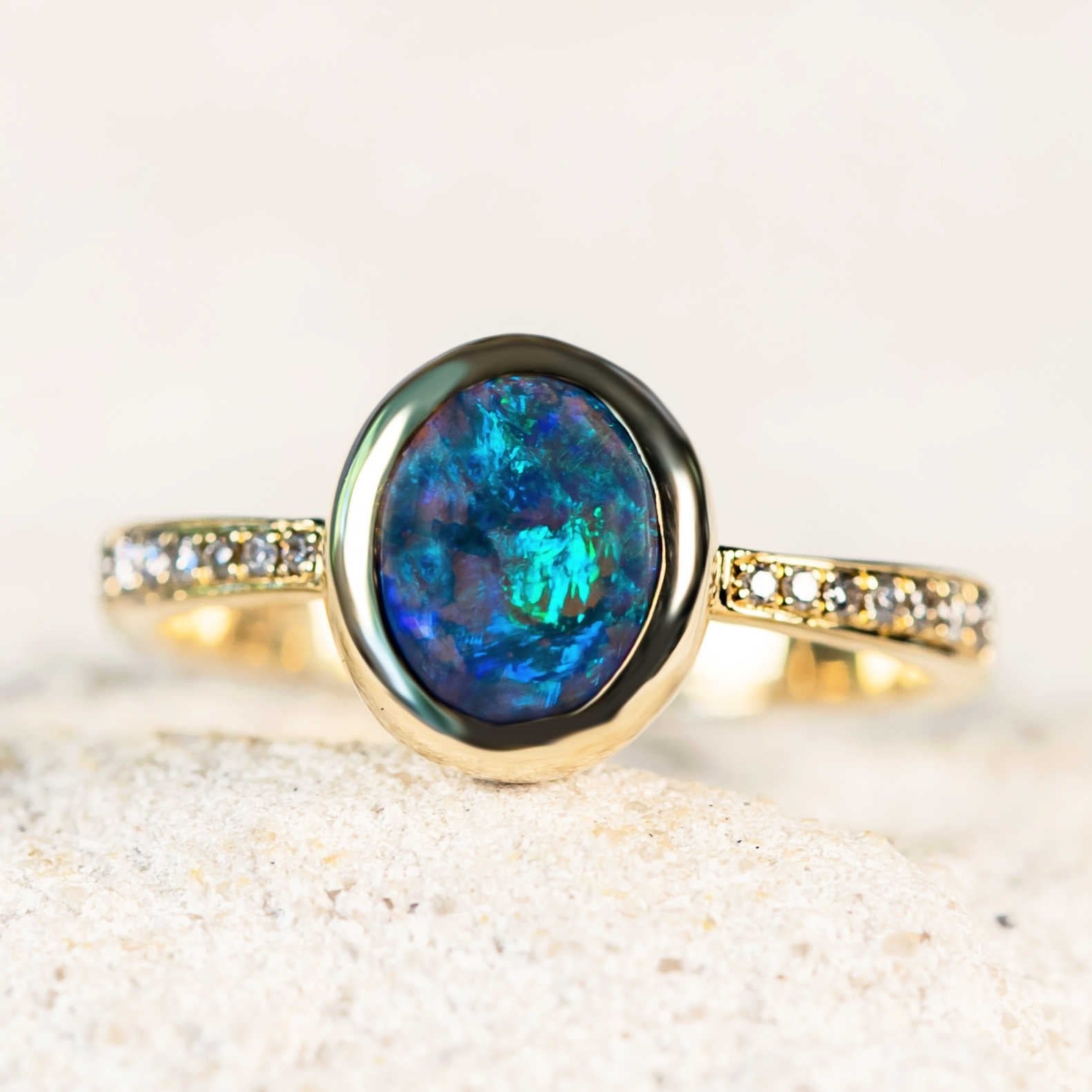 blue and green dark crystal opal 14ct gold ring from Lightning Ridge