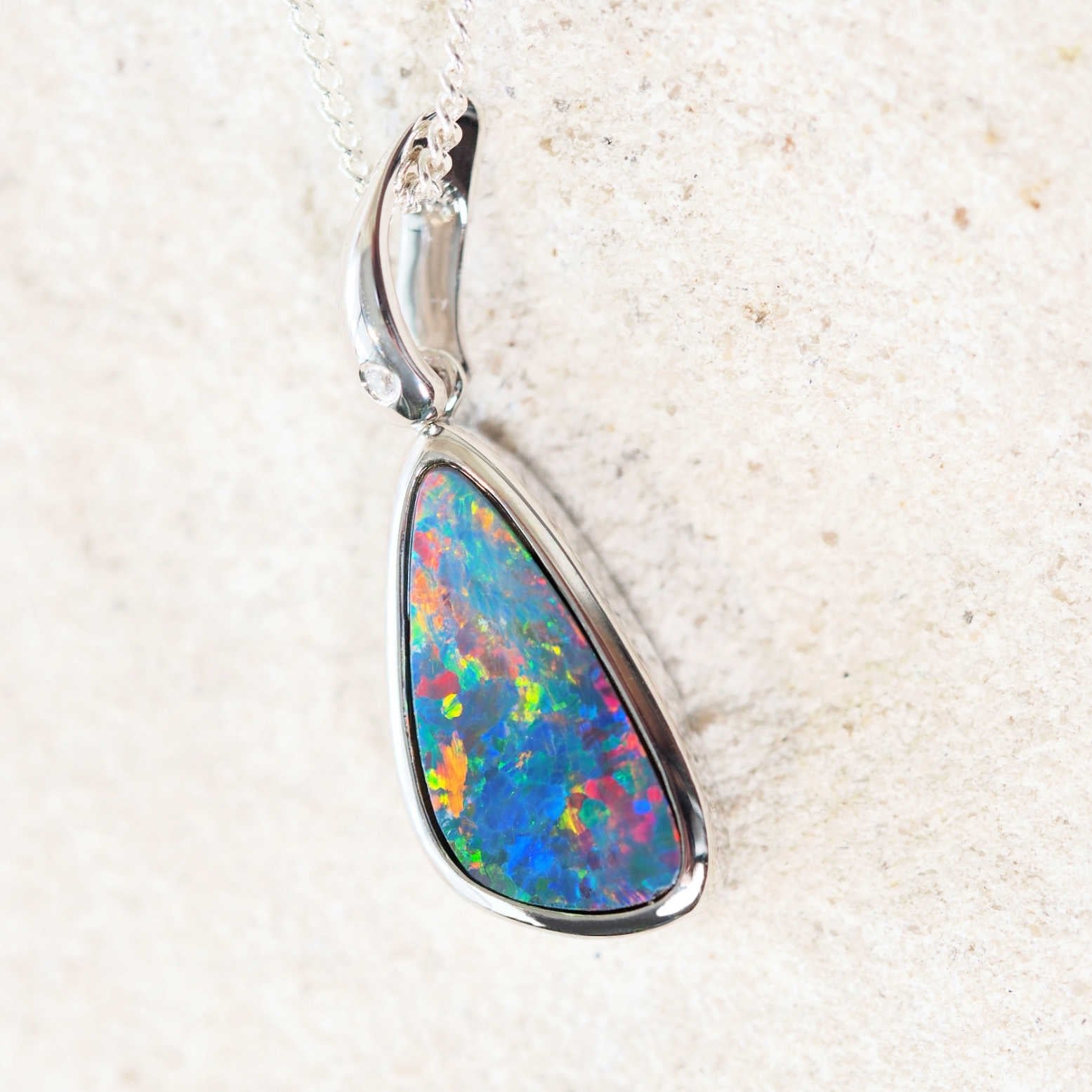 colourful teardrop shape australian opal pendant set in sterling silver